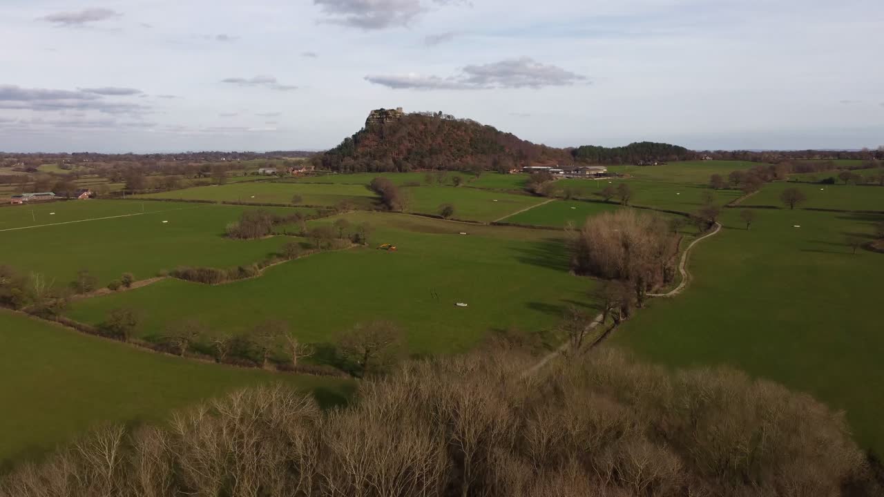 Drone approaching Beeston Castle from a distance - Cheshire, England, UK