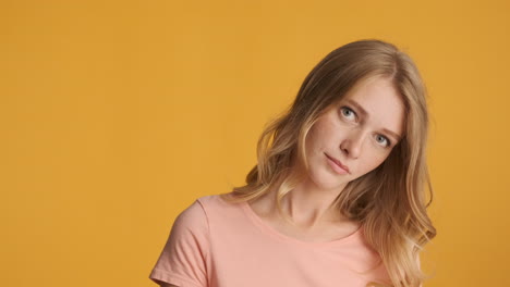 Caucasian-woman-rolling-her-eyes-on-camera.