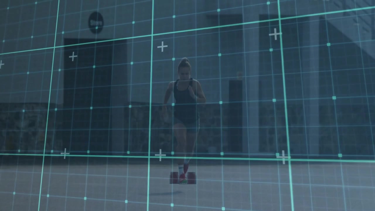 Female athlete grabbing red dumbbells and standing then jogging under grid scanning for fitness
