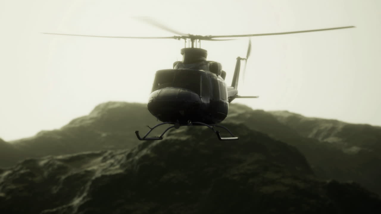 Flying over rugged terrain with a helicopter at dusk
