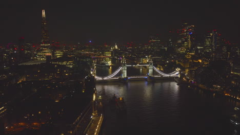 london skyline at night with tower bridge