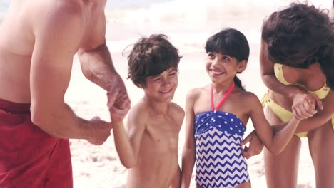 Happy-family-at-the-beach