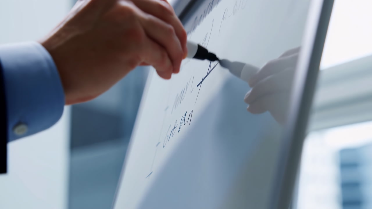 Closeup View Whiteboard Writing With Marker Showing Executive Planning Strategy In Modern Office Focused Hand