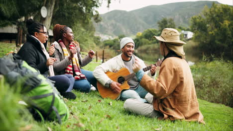 dance, guitar and friends camping at lake