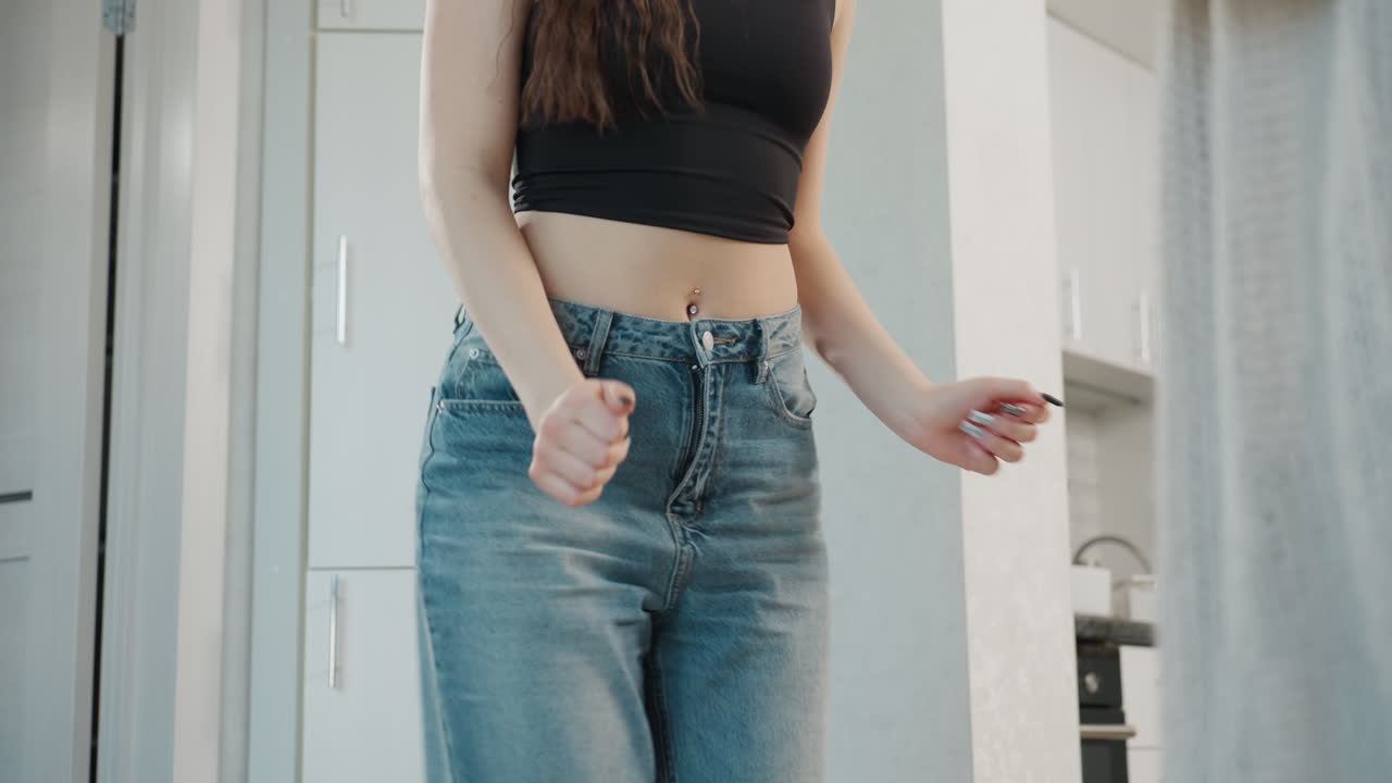 Young White Woman In Kitchen Styling And Arguing With Friend, Tense Hair Check, Curly Locks Examined By Companion, Expressive Gestures, Intimate Domestic Scene With Modern Cabinets And Natural Light