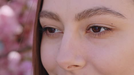 close-up of a young woman's face, profile view