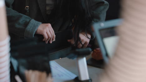 beautiful woman paying using credit card transaction service buying coffee in cafe spending money at restaurant