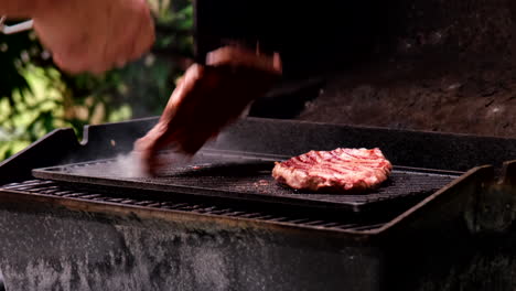 Hot-smoking-slice-of-red-meat-beef-on-the-grill