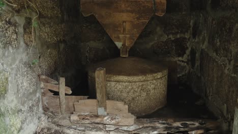 antique millstone in rustic watermill, gerês portugal