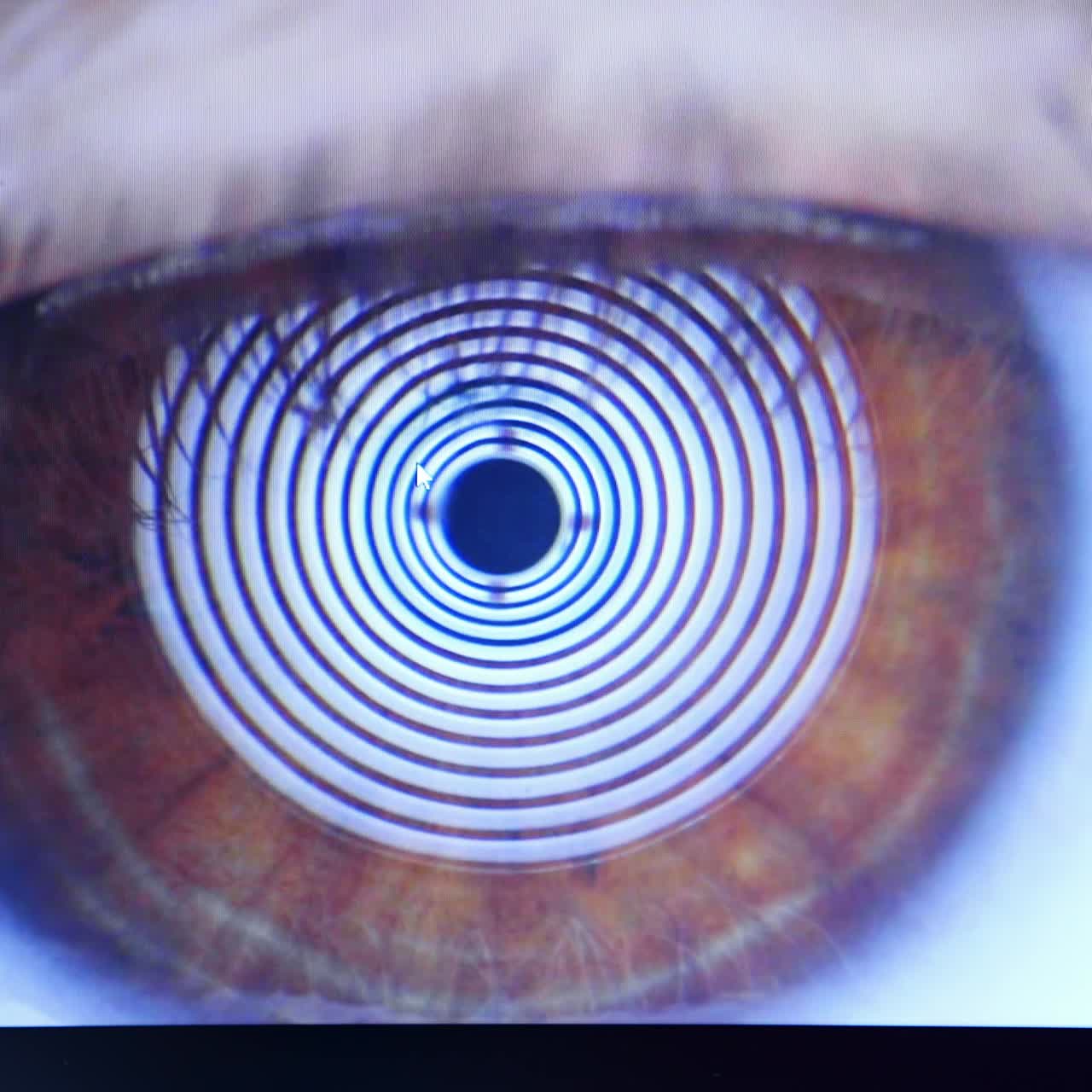 Ophthalmologist examining patient eyes