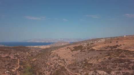 beautiful aerial drone shot of the landscape of the island of leftkes greece revealing the ocean in the distance