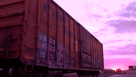 an old boxcar sits on a siding in this stylized shot