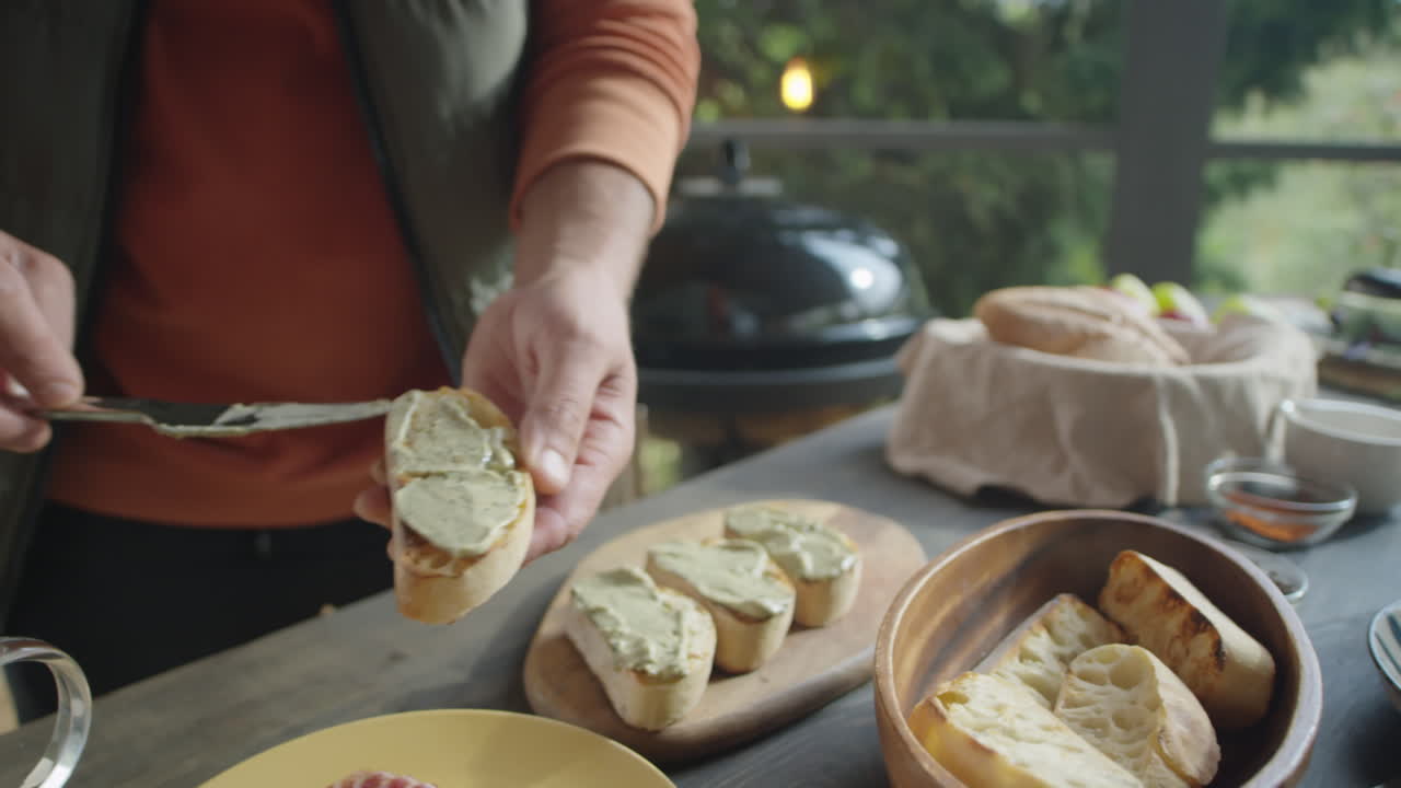 Preparing Bruschettas on Outdoor Terrace