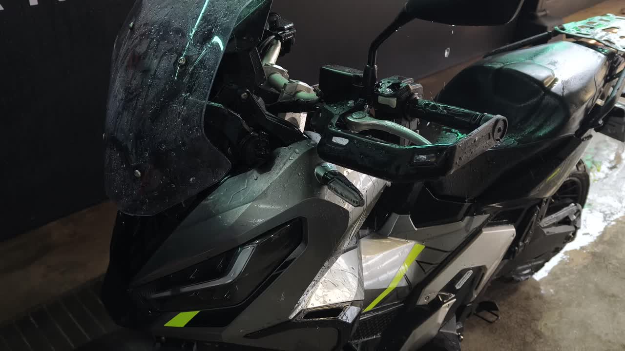 Washing a Grey Motorcycle