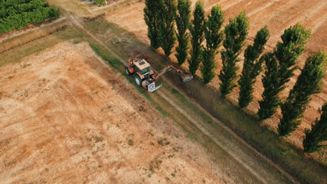 farm tractor working in a field