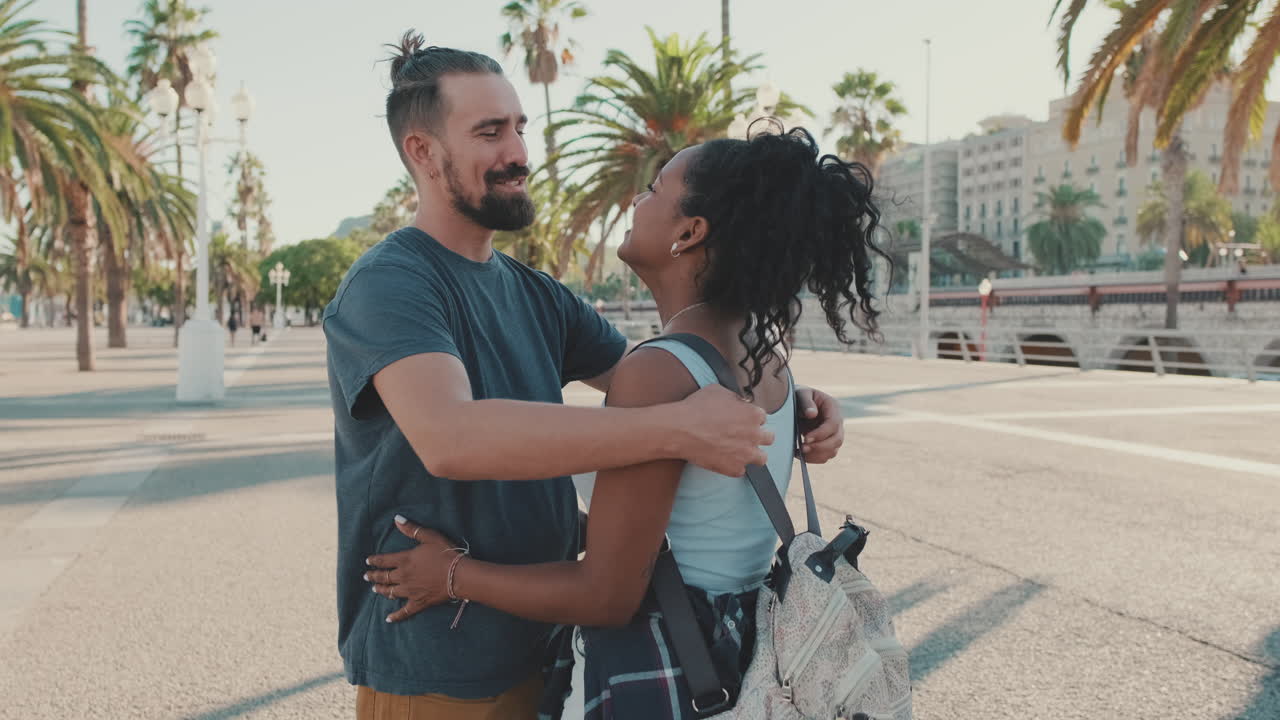 A Couple Embracing in a Tropical Setting