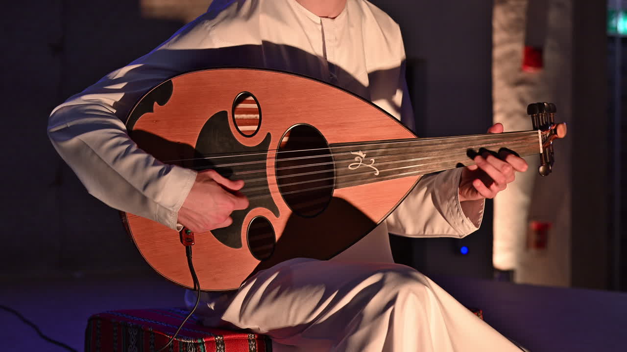 The oud, a staple of Arabic music, is played here by an Arab musician with deep cultural roots