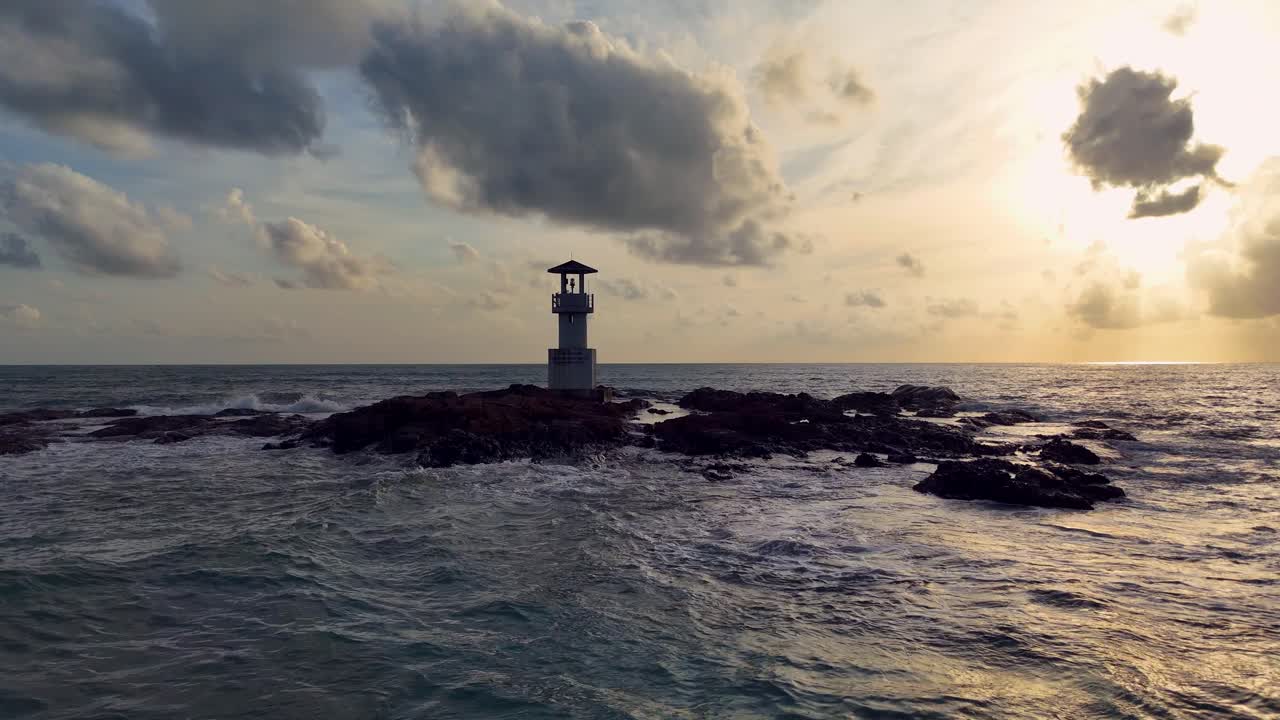 Scenic Lighthouse on Rocky Coast at Sunset