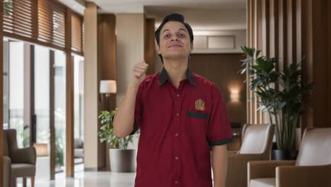 Happy-Indian-house-keeper-showing-thumbs-up