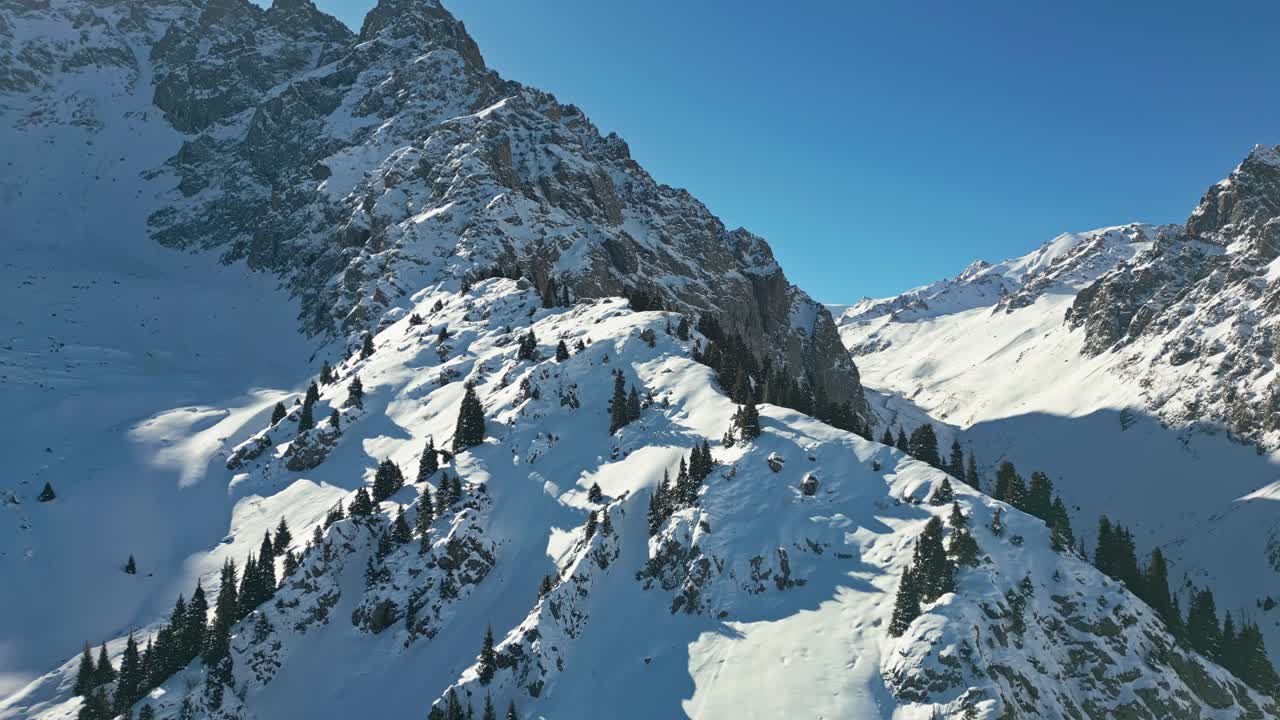 Snowfields gleam in morning light, frozen throne in sky’s great height