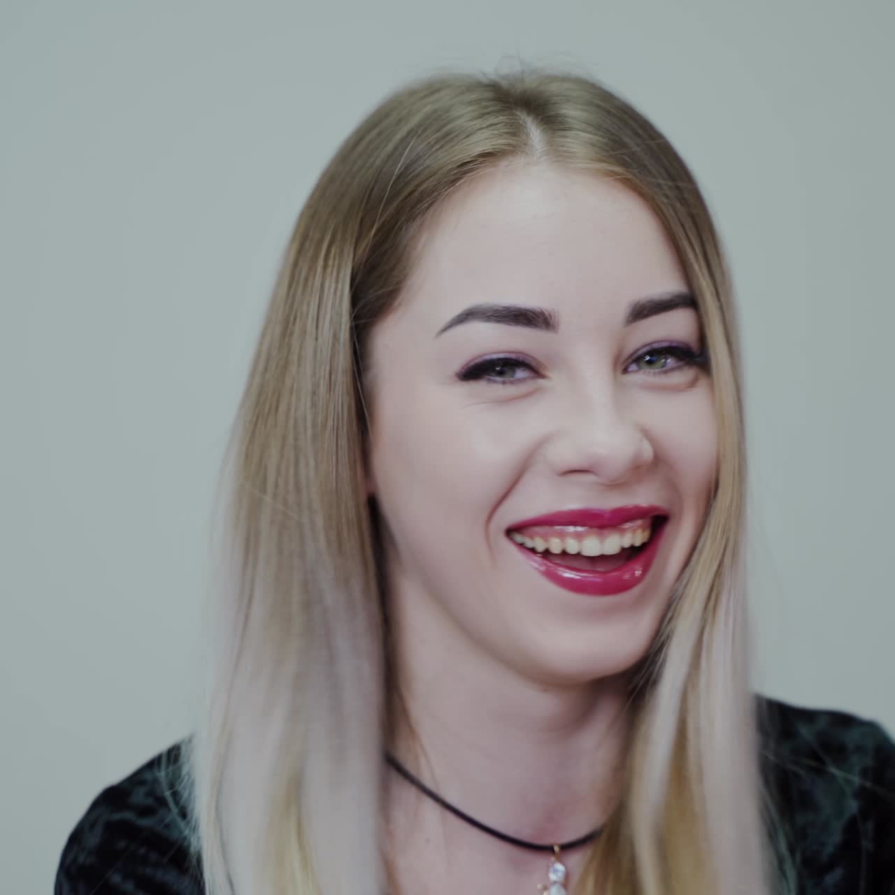 . Beauty Woman Face Portrait. Happy beautiful woman face close up in studio
