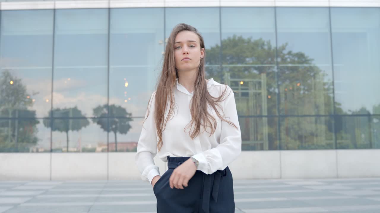 Business woman folding money cash and put in her pocket