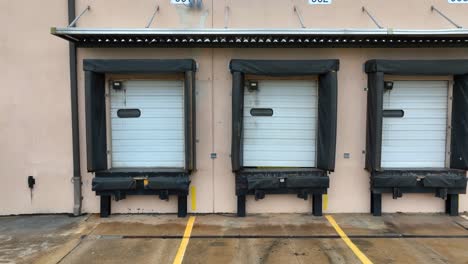 establishing shot of a loading dock for tractor trailers