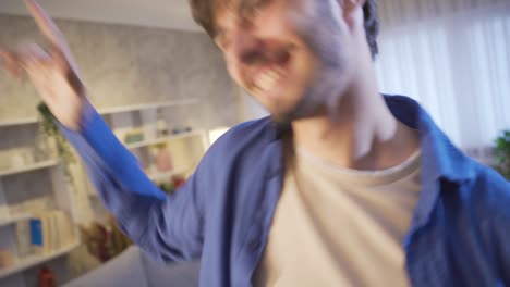 Cheerful-dancer-having-fun-in-the-hall-at-home-dancing-alone.