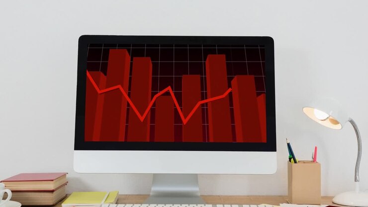 Animation of financial data processing with red line over computer screen on desk