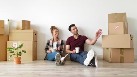 Dreaming-couple-in-their-new-flat