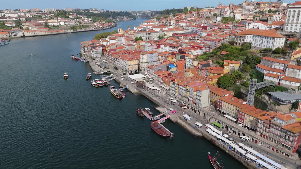 Aerial approach of Porto, Portugal over the Duro river