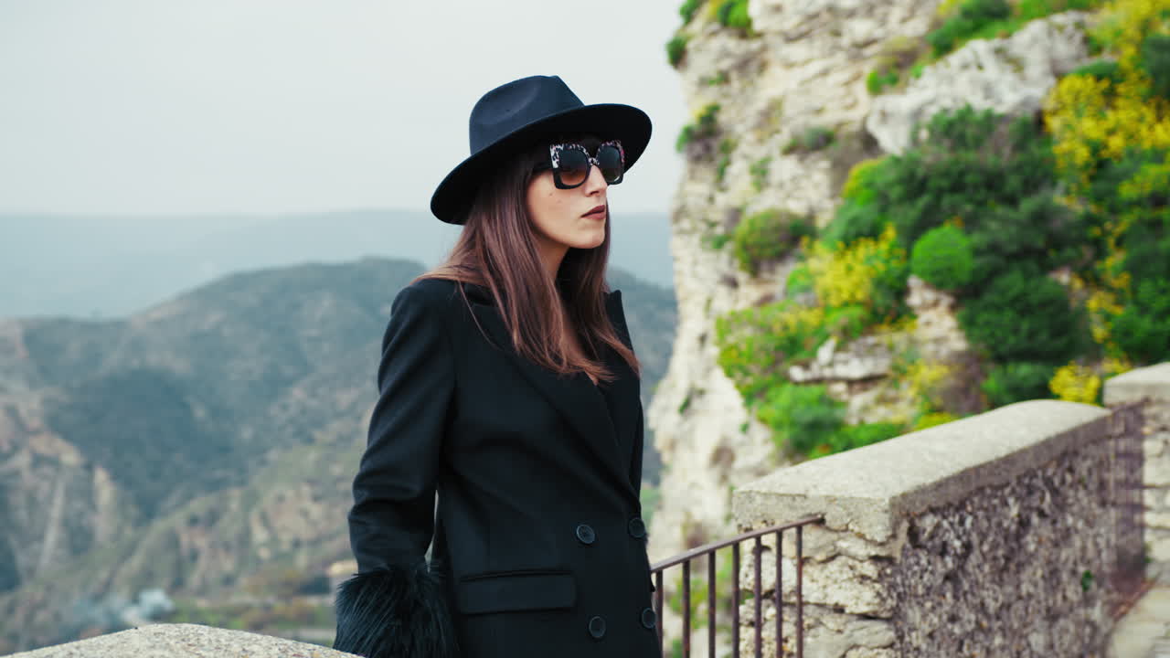 Elegant Woman With Sunglasses And A Suggestive Natural Background Behind