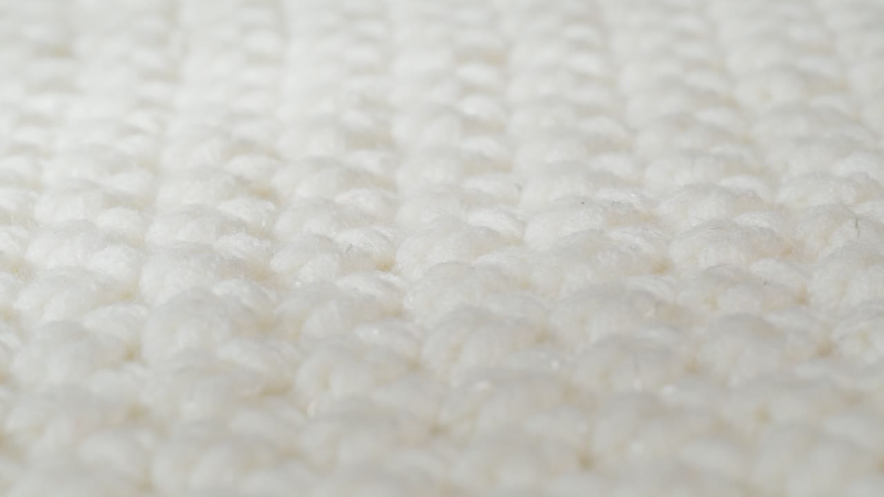 Close-up of a knitted white fabric