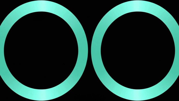 Two Glowing Cyan Circles Expanding and Contracting on Black Background