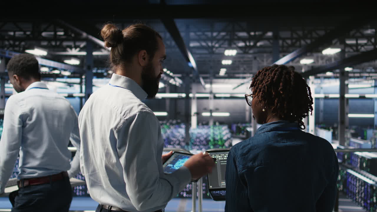 Data center system administrators performing maintenance on AI supercomputers