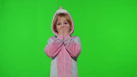 Amazed-astonished-young-kid-girl-in-unicorn-costume-pajamas-showing-wow-reaction,-perfect-surprise