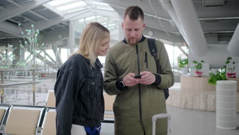 couple waiting at airport