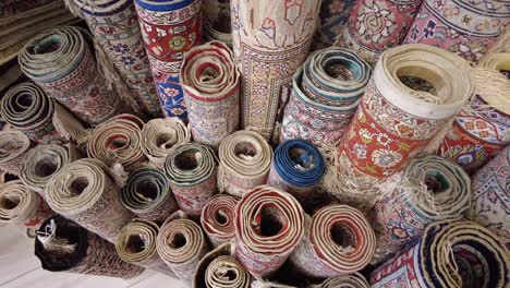 rolled up carpets and rugs