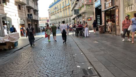 people walking on a bustling city street