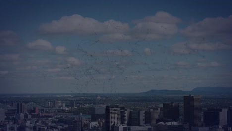 animation of shapes moving over cityscape