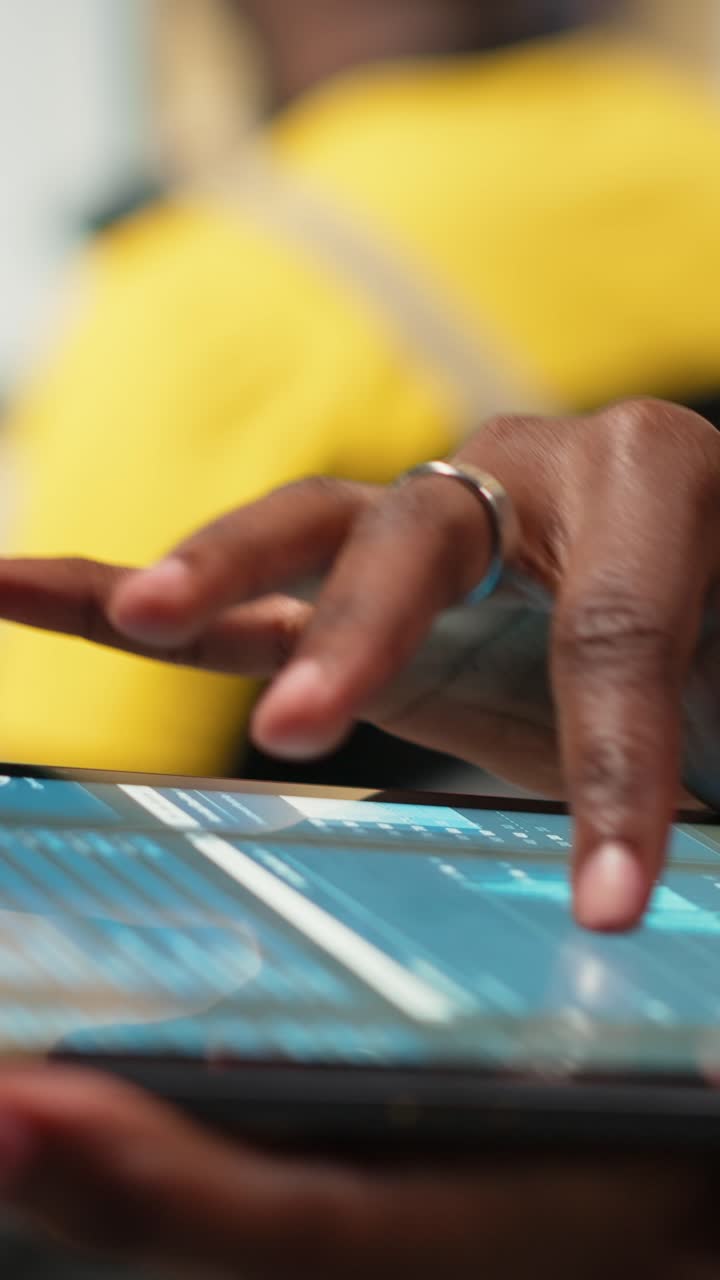 Vertical Video Close up of distribution hub worker overseeing supply chain process