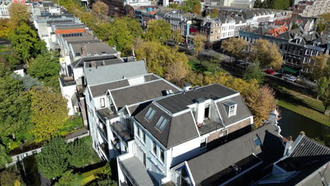 Aerial-view-looking-down-over-Rotterdam-downtown-property-rooftops-from-scenic-high-rise-city-skyscrapers