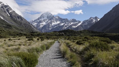 Beautiful-green-valley-with-majestic-mountains-above