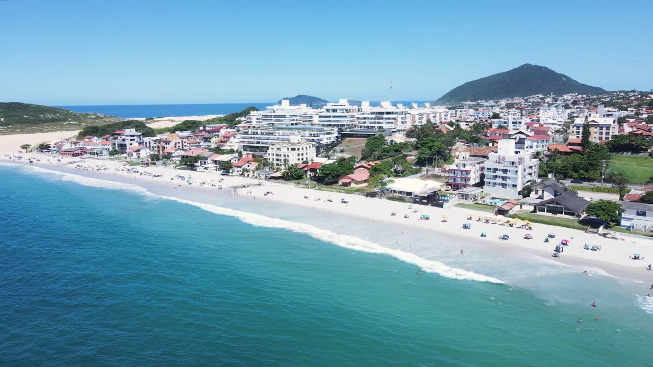 Panoramic aerial view of Ingleses beach in Florianópolis, Santa Catarina, an urban complex on the coast, city master plan, neighborhoods and real estate developments facing the sea