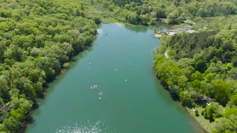 a small corner of a forest mountain lake embedded in the evergreen covered hills of wisconsin, usa