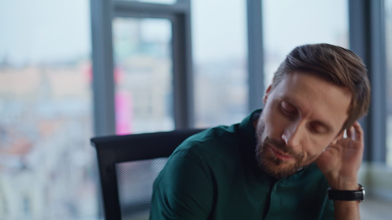 Tired ceo suffering eyestrain taking off glasses at office workspace closeup