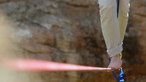 mountaineer walking on the tightrope 4k