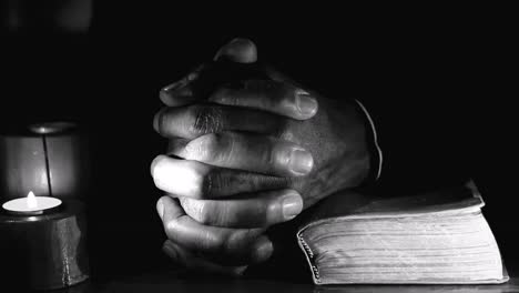 praying-to-God-with-bible-faithfully-worshipping-with-people-stock-footage-stock-video