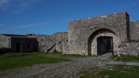 Castle-gate-and-thick-stone-walls-inside-ancient-fortress-in-Shkoder,-Albania