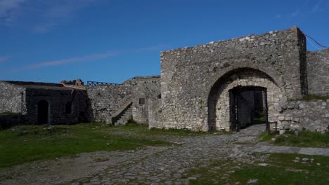 castle gate and thick stone walls inside ancient fortress in shkoder, albania